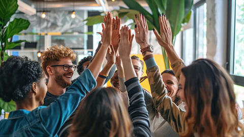 group of people high fiving