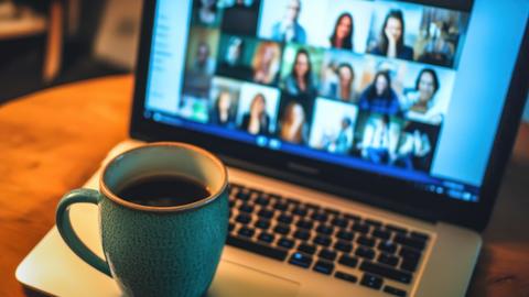 coffee mug sitting on laptop keyboard