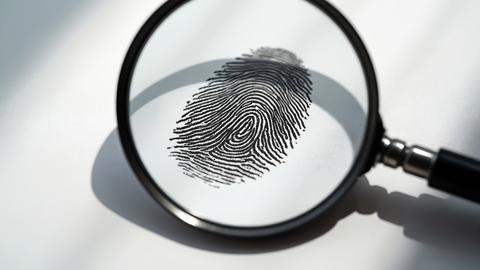 thumbprint under magnifying glass