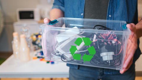 electronic waste in recycling container close-up