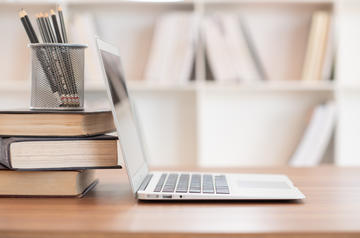 laptop and books