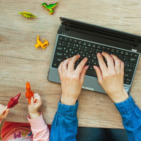 hands on a laptop